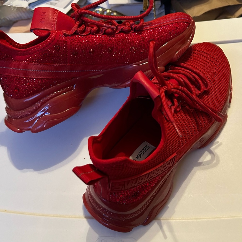 Men/Ladies Red Steve Madden sneakers